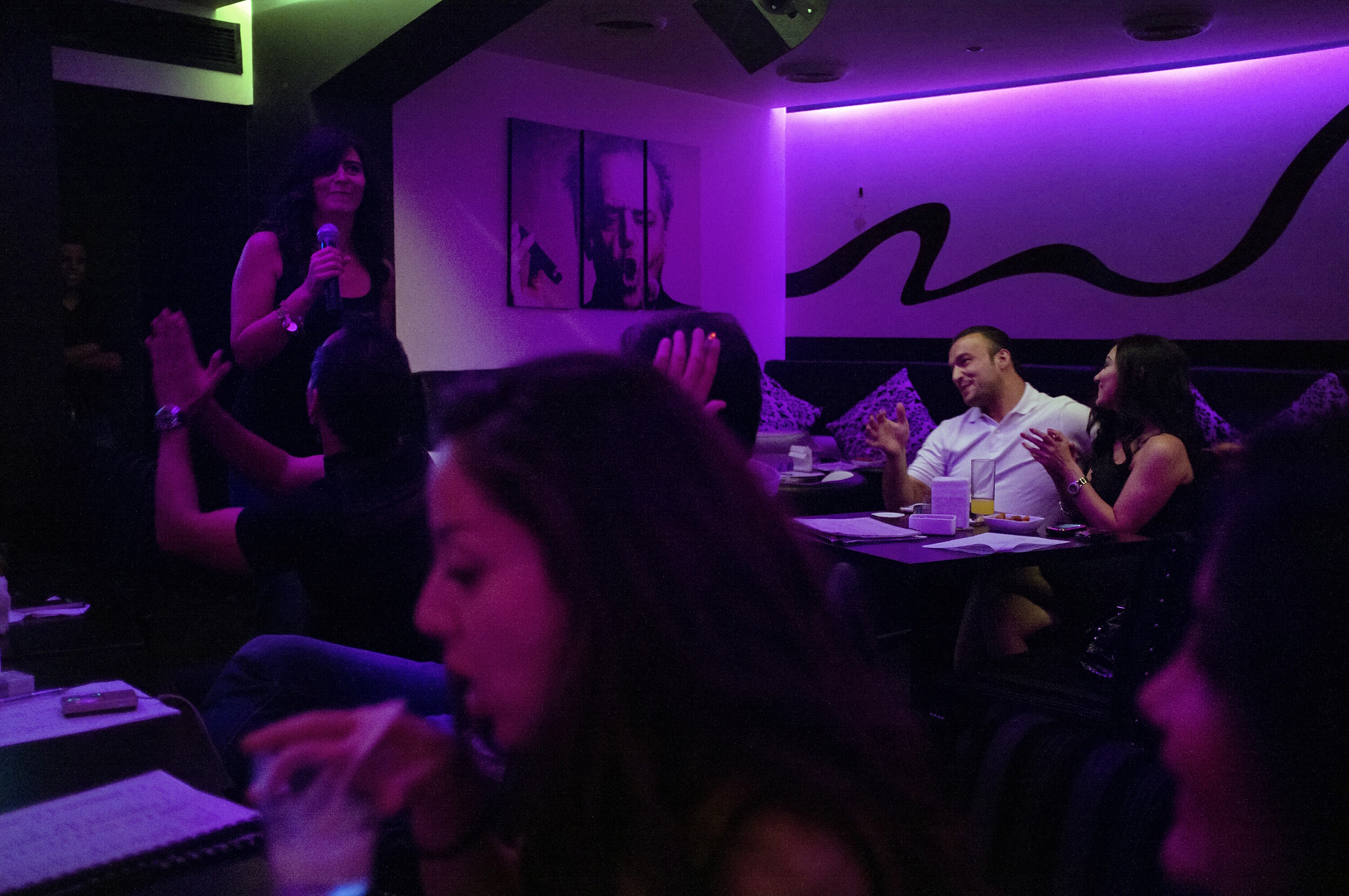 Damascus elite at a karaoke bar.